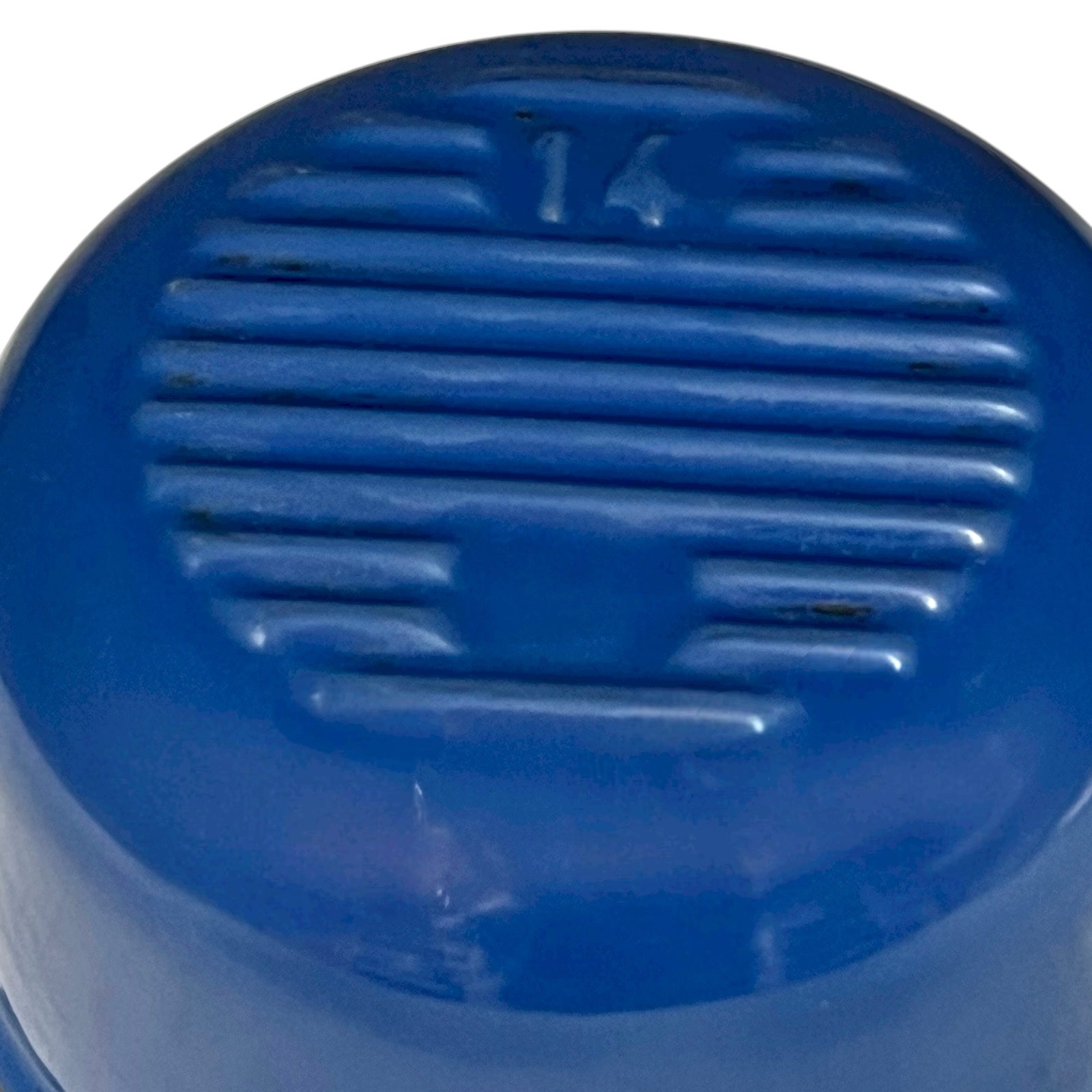Close-up of a blue pan base with textured surface