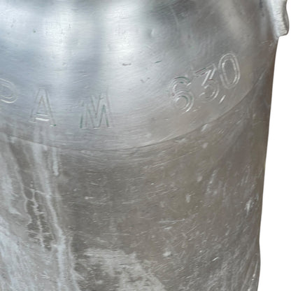 close up of milk churn