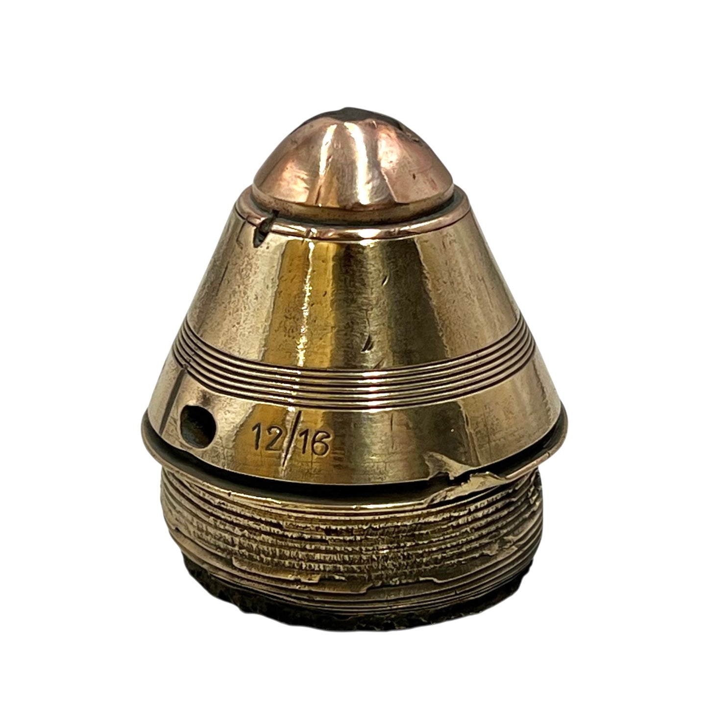 Polished British brass WW1 fuse or paperweight type 101 on a white background