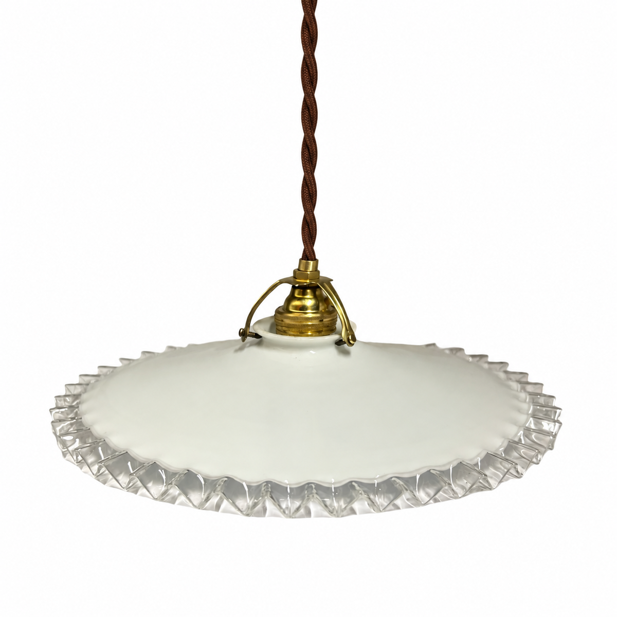 A vintage-style pendant light with a white scalloped glass shade, a brass metal fixture, and a brown twisted cord, shown against a plain white background.