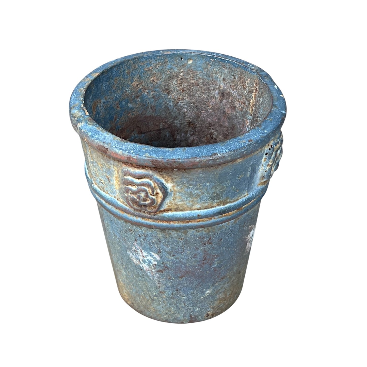 close up of a metal decorative wall planter on a white background