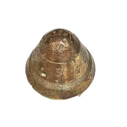 WW1 brass fuse paperweight on a white background 
