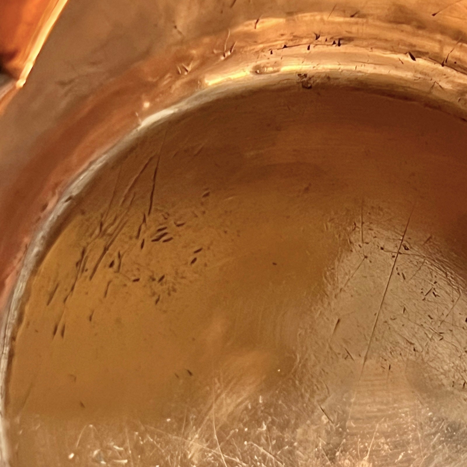 inside of copper sugar pan