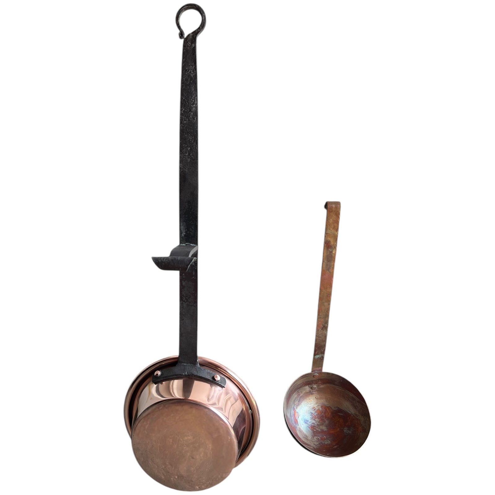 copper pan and ladle shown for scale
