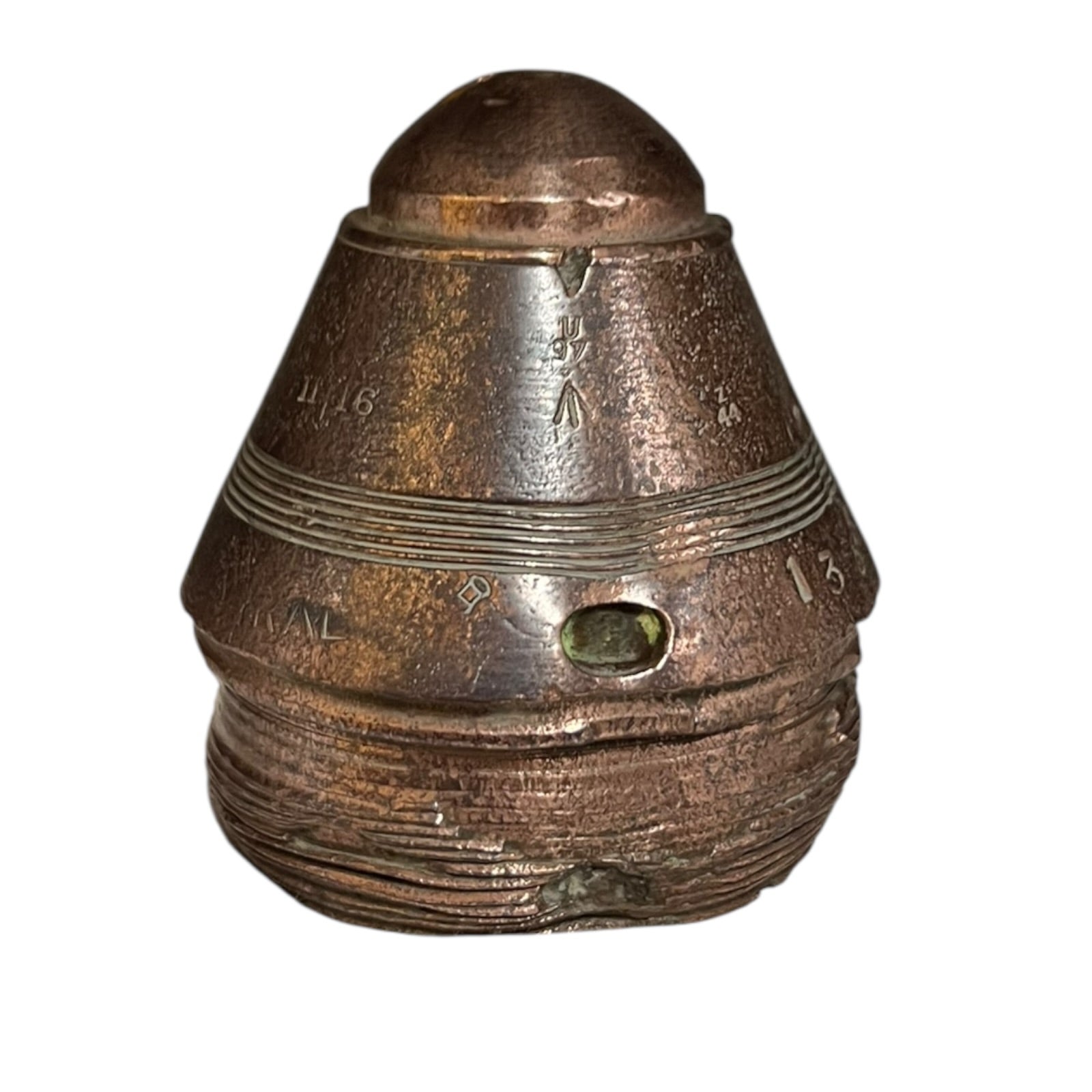 Brass metal cap fuse on a white background