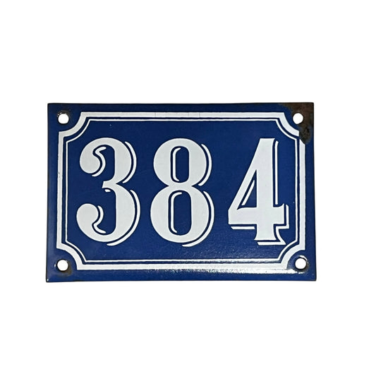 Vintage French enamel rectangular door umber plate with white numbers '384' ideal for a French style door or home on a white background