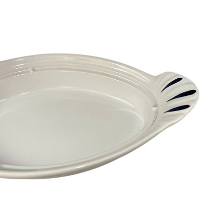 Ceramic dish shaped like a duck with Foie Gras' text on a white background