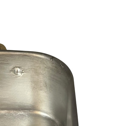 Close up of a Copper roasting pan with tin lining on a white background