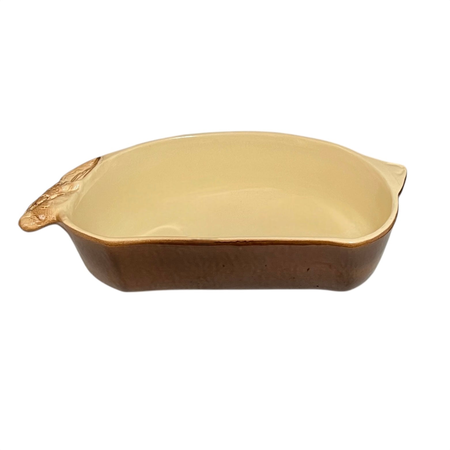 A beige ceramic 2-litre casserole dish shaped like a rabbit, featuring a brown exterior, perfect for serving game dishes or adding charm to a farmhouse-style country kitchen, set against a white background.