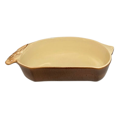 A beige ceramic 2-litre casserole dish shaped like a rabbit, featuring a brown exterior, perfect for serving game dishes or adding charm to a farmhouse-style country kitchen, set against a white background.