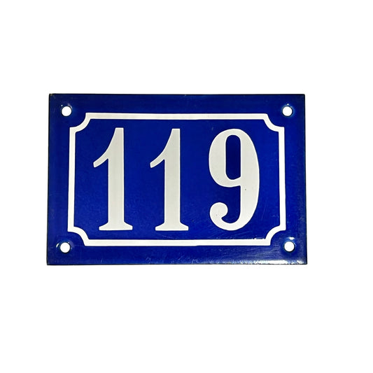 Blue rectangular enamel house number plate with white text '119' ideal for French style home decor on a white background