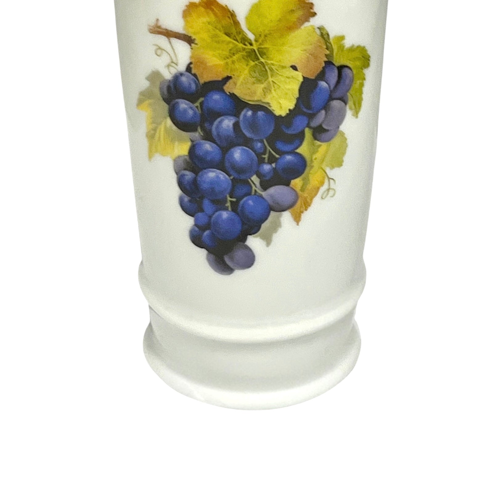 Ceramic decanter with a design of grapes and leaves on a white background