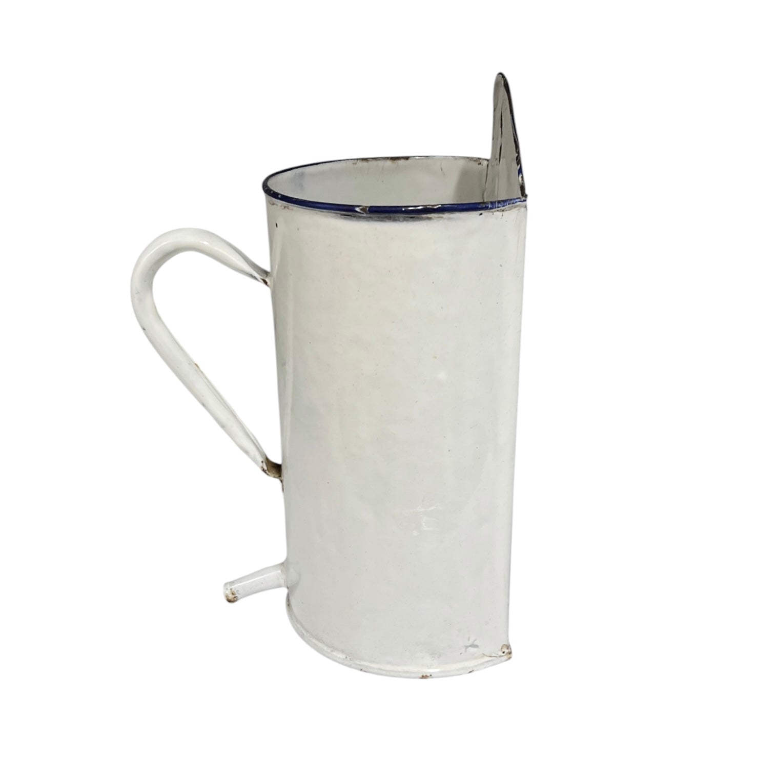 A vintage white enamel pot with a blue rim, a curved handle, and a small spout, shown against a plain white background.