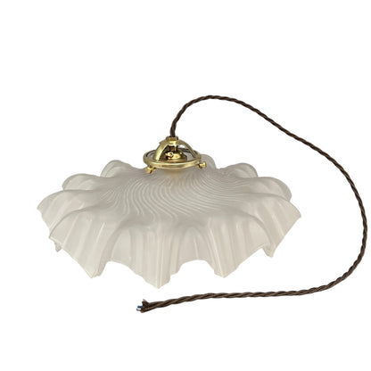 A French vintage frosted clear glass lampshade with a charming frilled edge, featuring a brass collar, bulb holder, and vintage-style twisted wiring. Perfect for adding a touch of period elegance to any vintage-inspired home decor, set against a crisp white background.