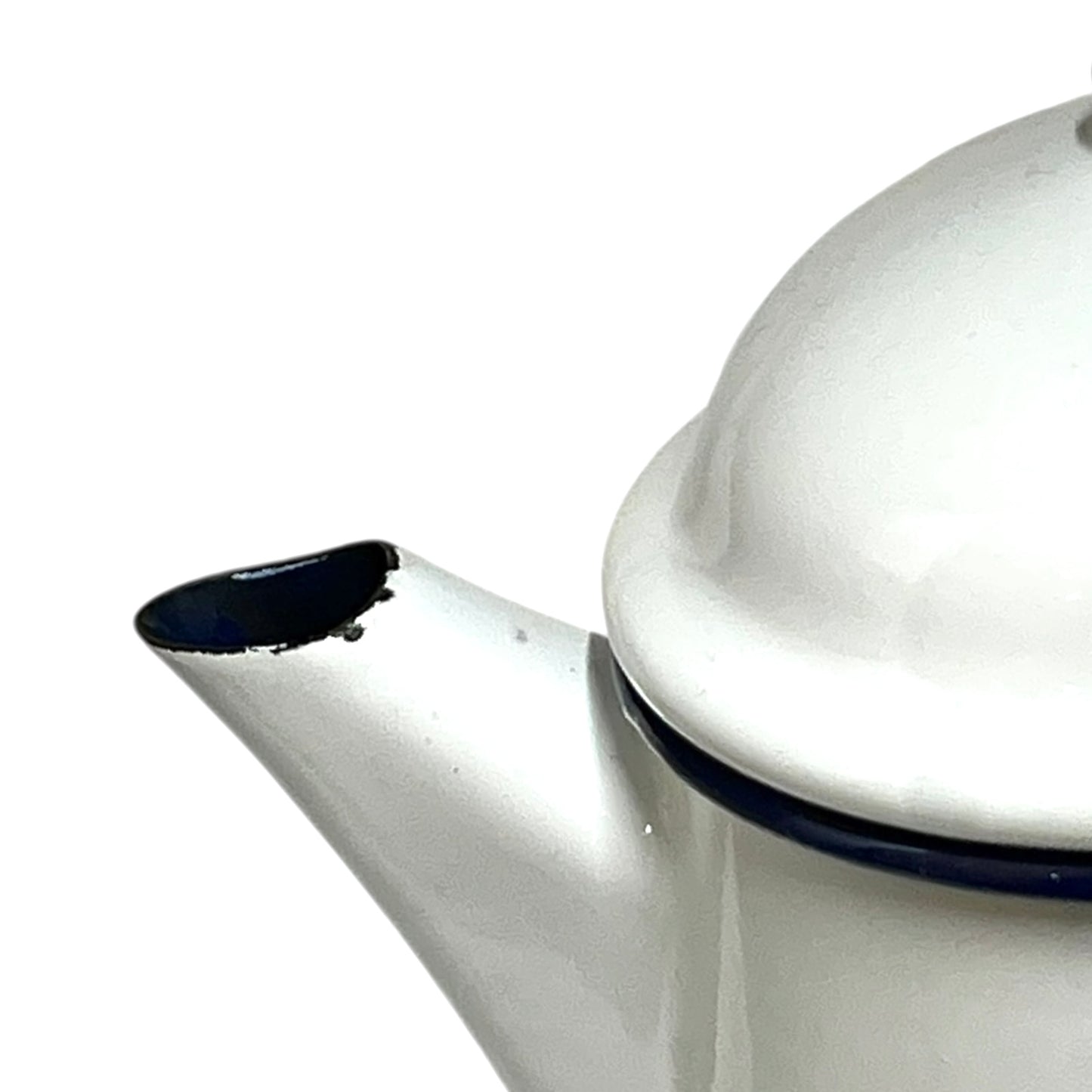 Close up of an enamel coffee pot on a white background
