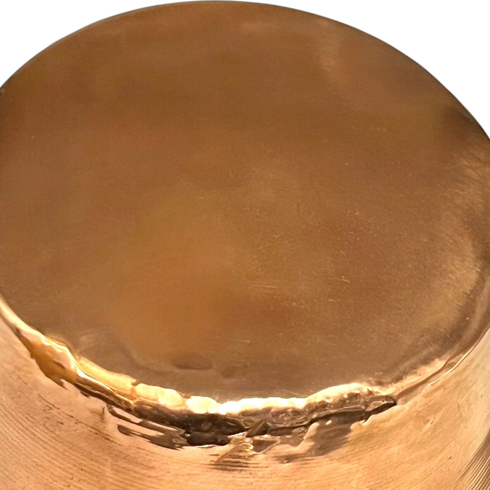 Close up of French vintage copper ladle pan with a black handle on a white background