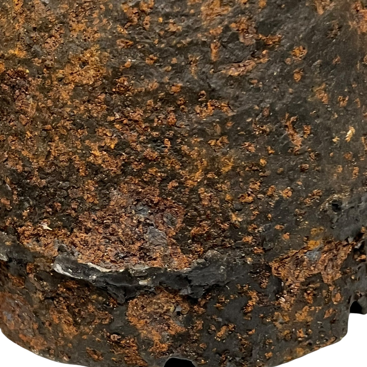 Close up of WW1 brass fuse on a white background