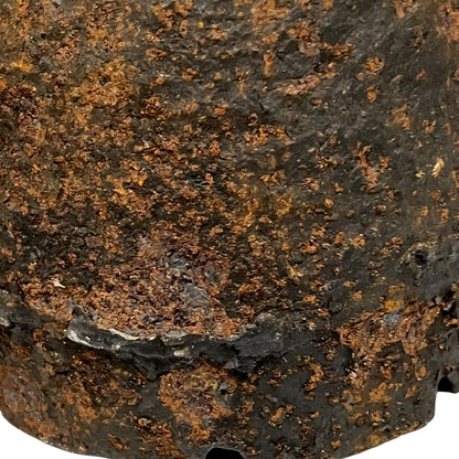 Close up of WW1 brass fuse on a white background