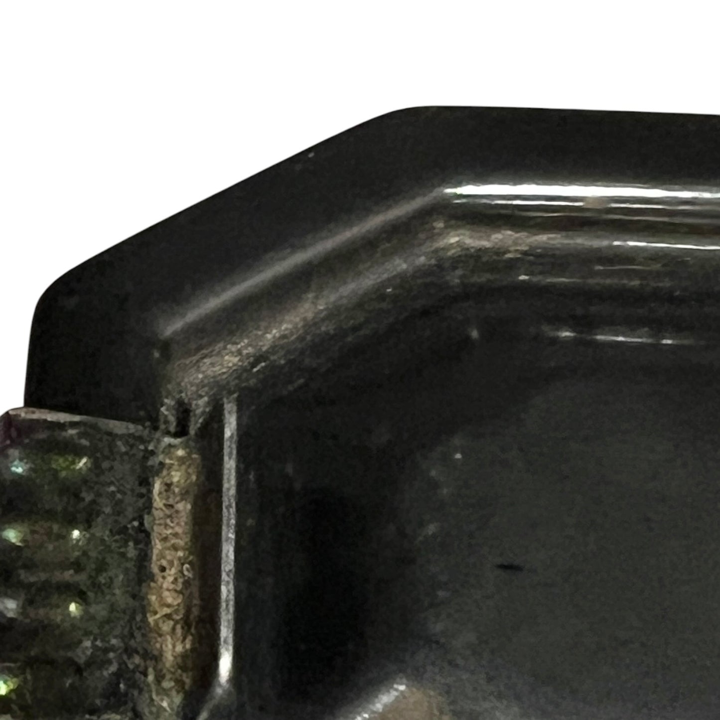 Close up of a French enamel lunch box on a white background