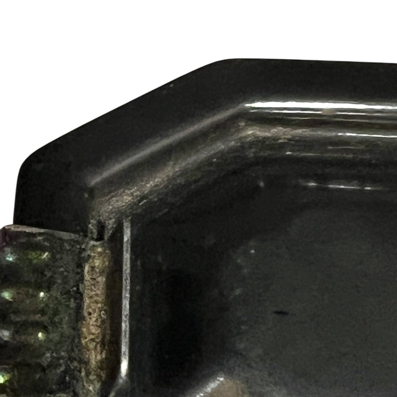 Close up of a French enamel lunch box on a white background