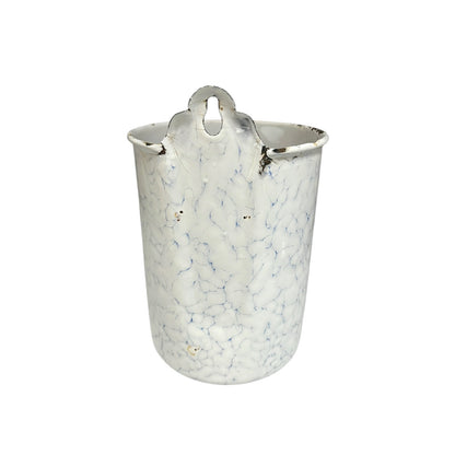 close up of a vintage garden planter on a white background
