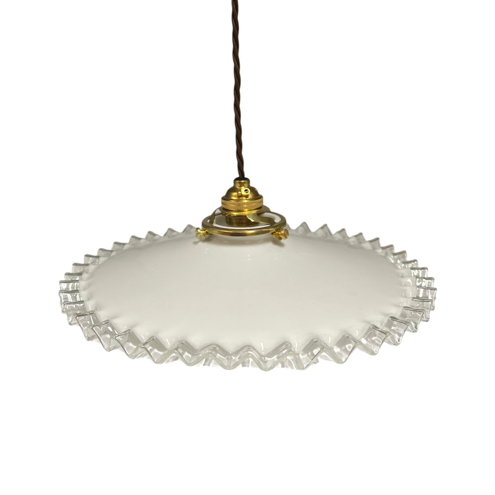 A vintage-style pendant light with a white frosted glass shade featuring a scalloped, fluted edge and a gold metal top cap, suspended by a dark brown cord against a white background.