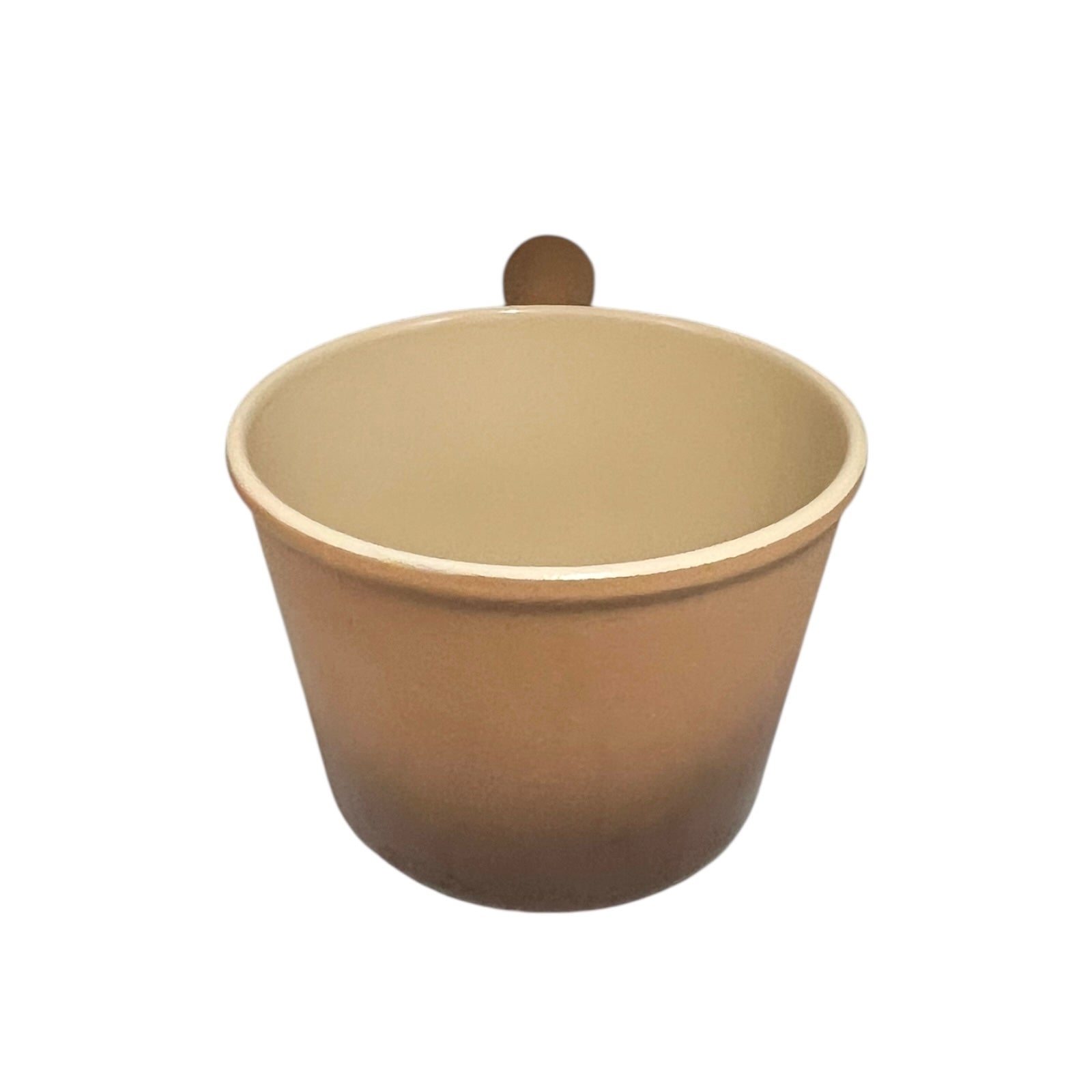 Brown Le Creuset vintage saucepan with handle on a white background