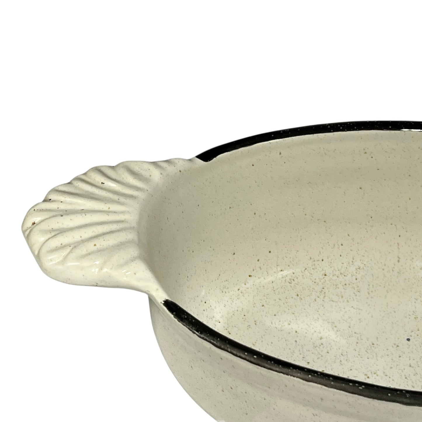White ceramic dish with black interior on a white background