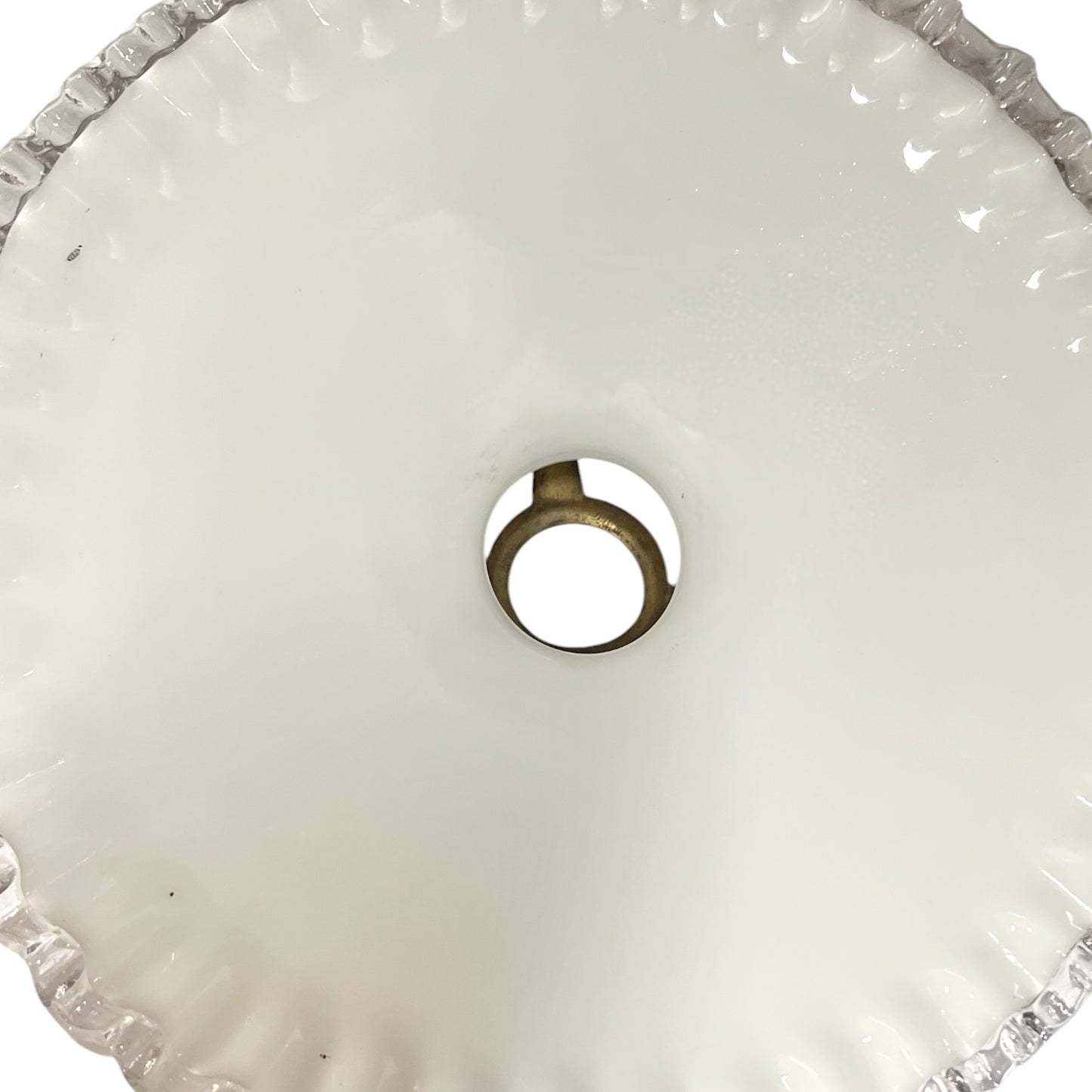 close up of white glass lampshade inner view