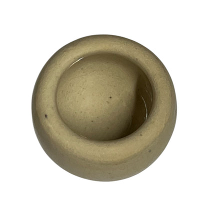 Set of beige ceramic escargots snail cups on a white background