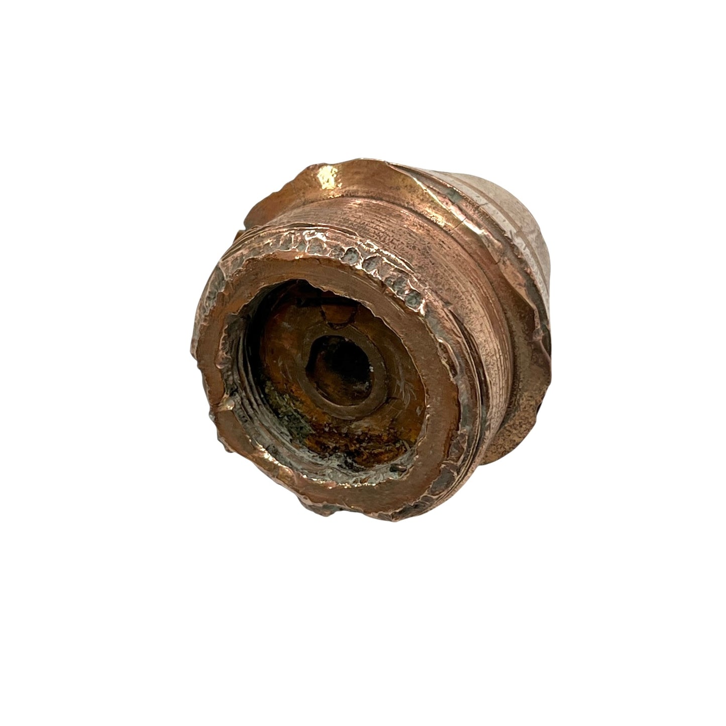 WW1 brass fuse paperweight on a white background