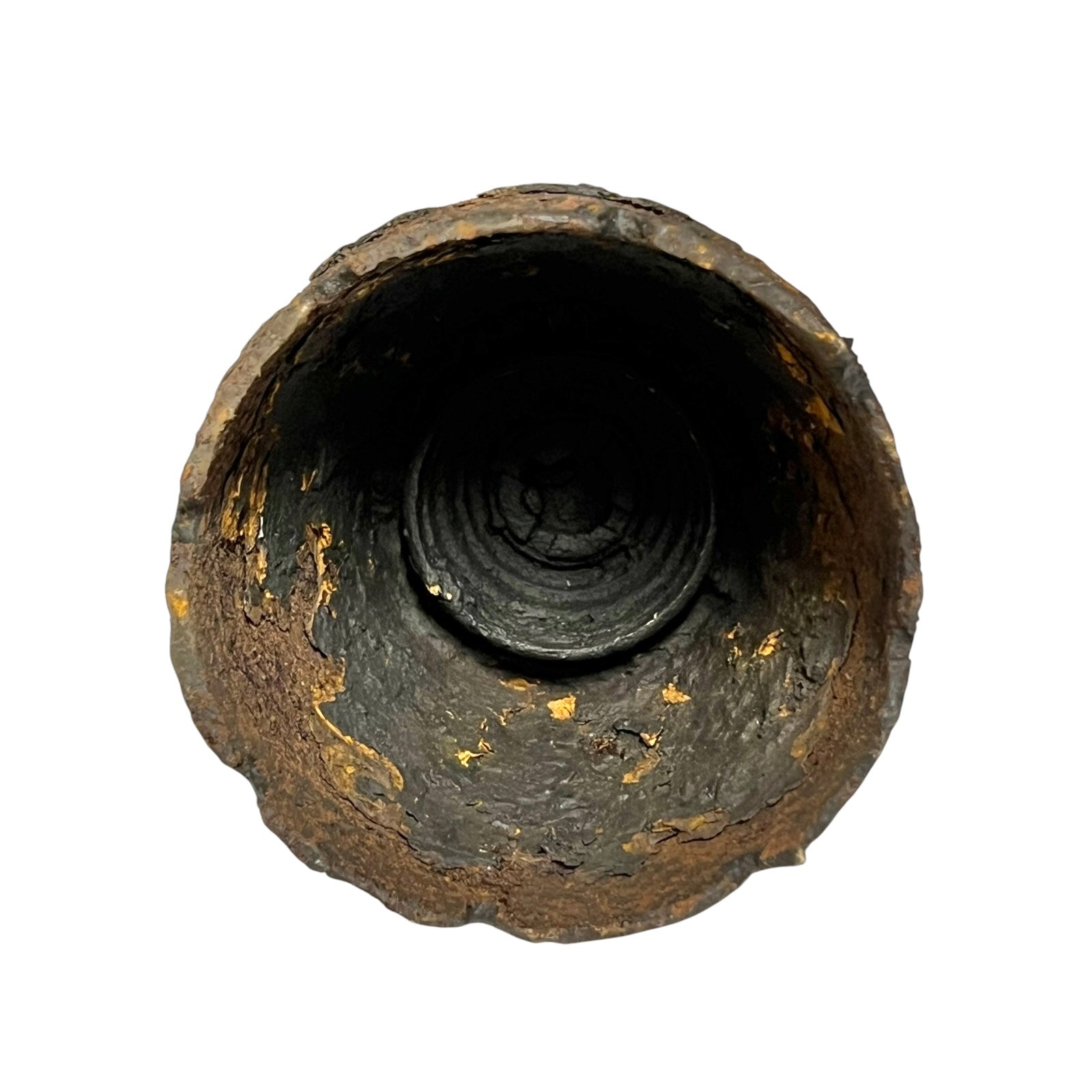 Close up of WW1 brass fuse on a white background