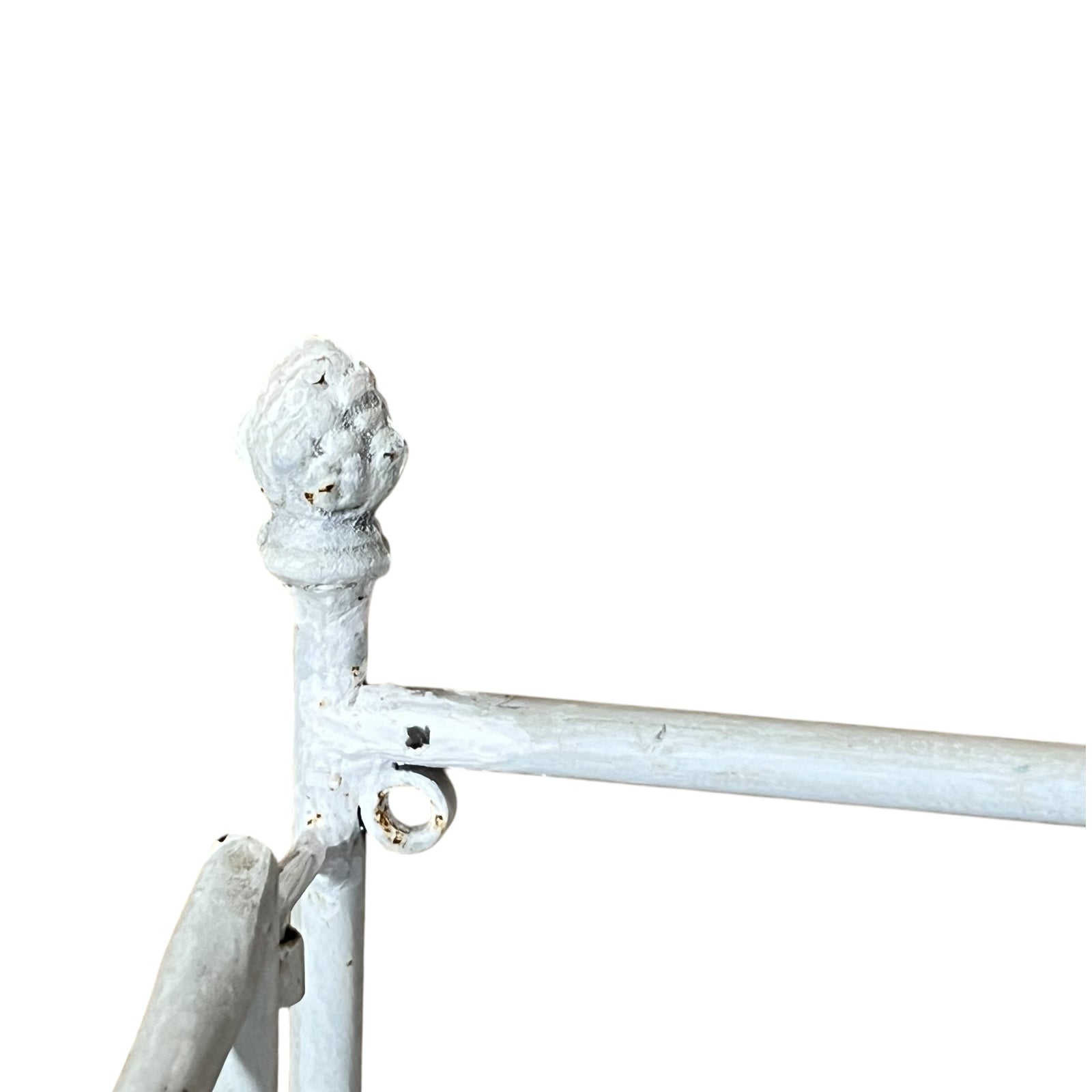 Close-up of a metal she with visible wear and tear on a white background