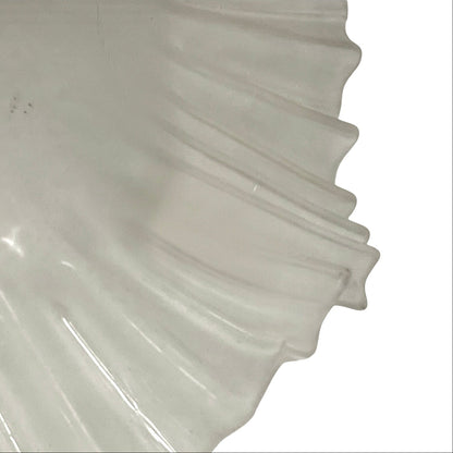 Close-up of a textured white ceiling light fixture