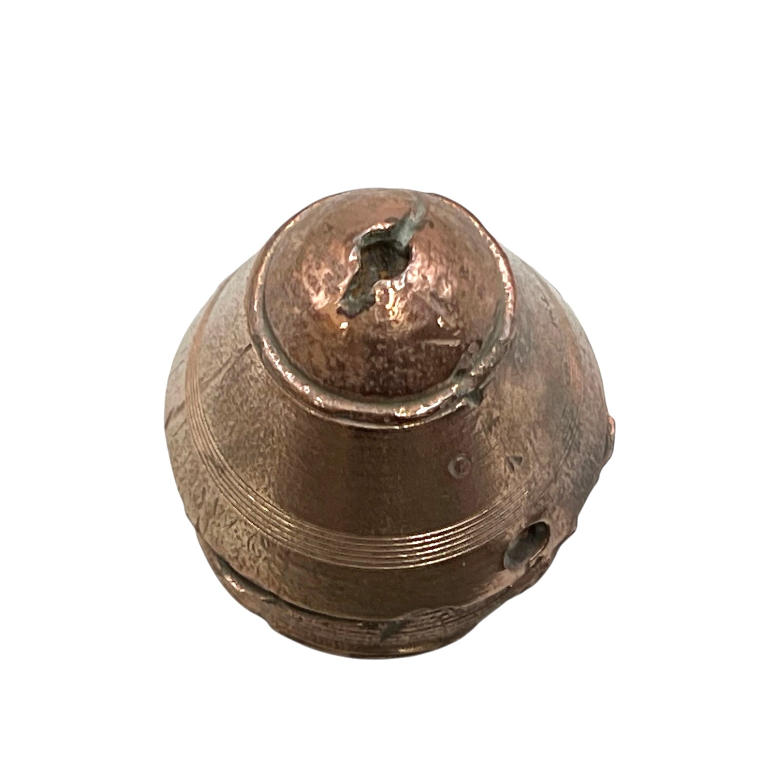 WW1 brass fuse paperweight on a white background