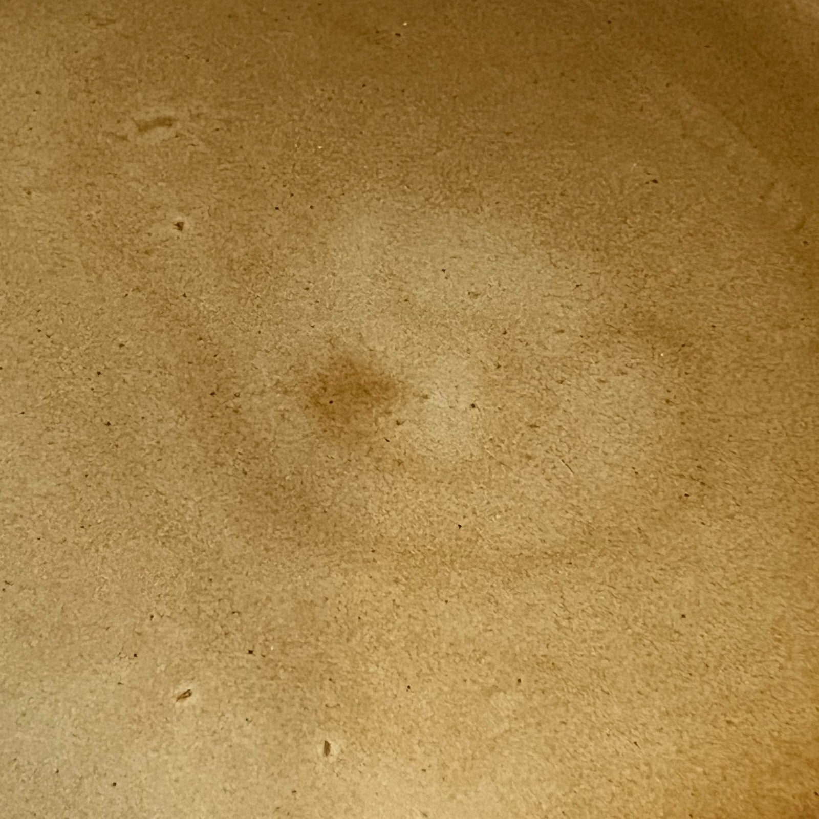 close up of brown ceramic plate 