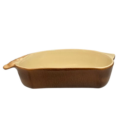 A beige ceramic 2-litre casserole dish shaped like a rabbit, featuring a brown exterior, perfect for serving game dishes or adding charm to a farmhouse-style country kitchen, set against a white background.