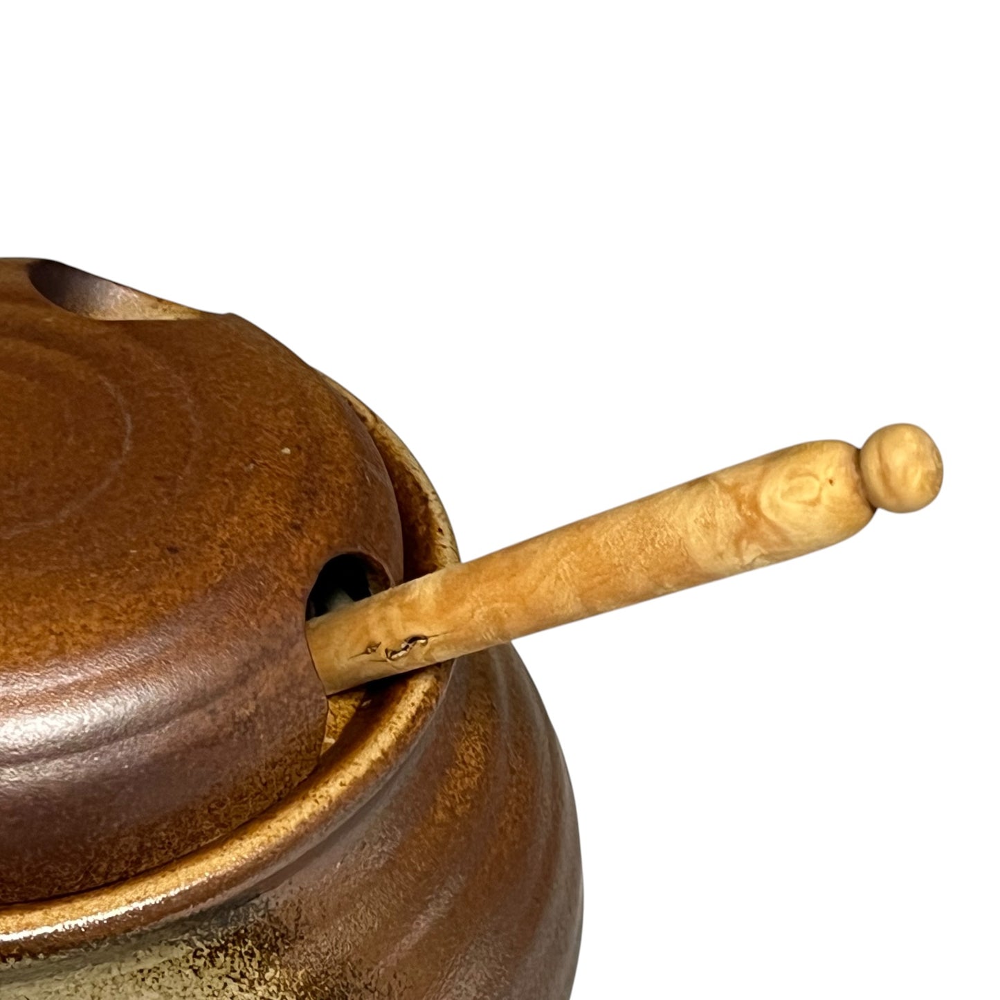 Close-up of a ceramic container with 'Olive' engraved on it, on a white background.