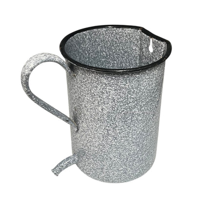 Vintage French grey and white speckled irrigator with a spout and a handle on a white background