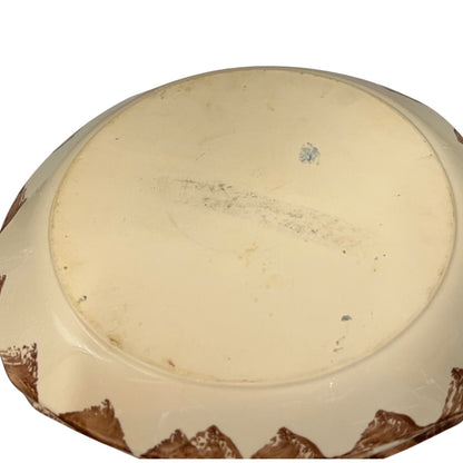 Reverse of a French dinner plate on a white background
