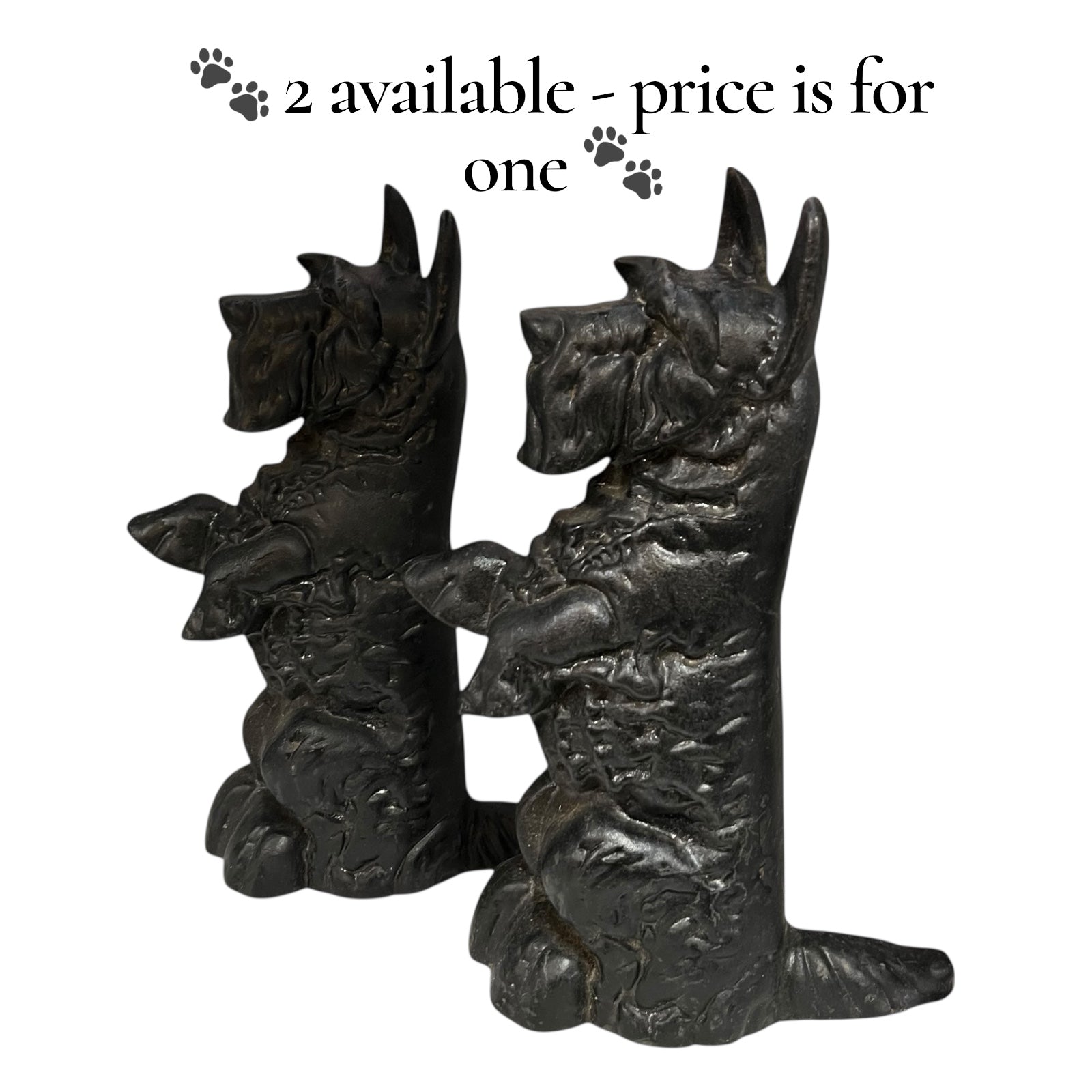 2 Black Scottish terrier cast iron doorstops on a white background 