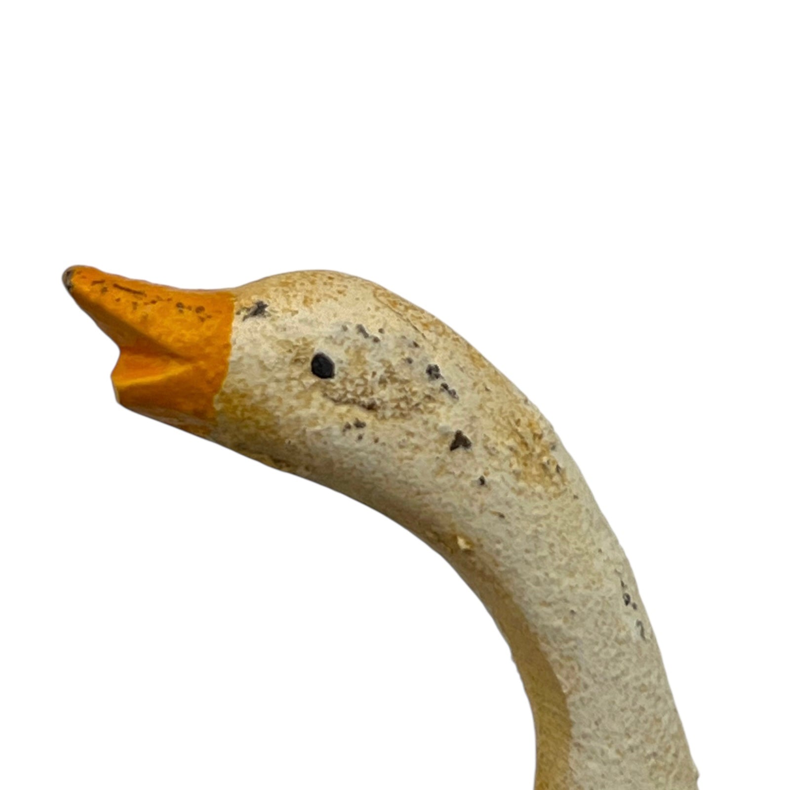 close up of toilet paper holder with a goose design on a white background