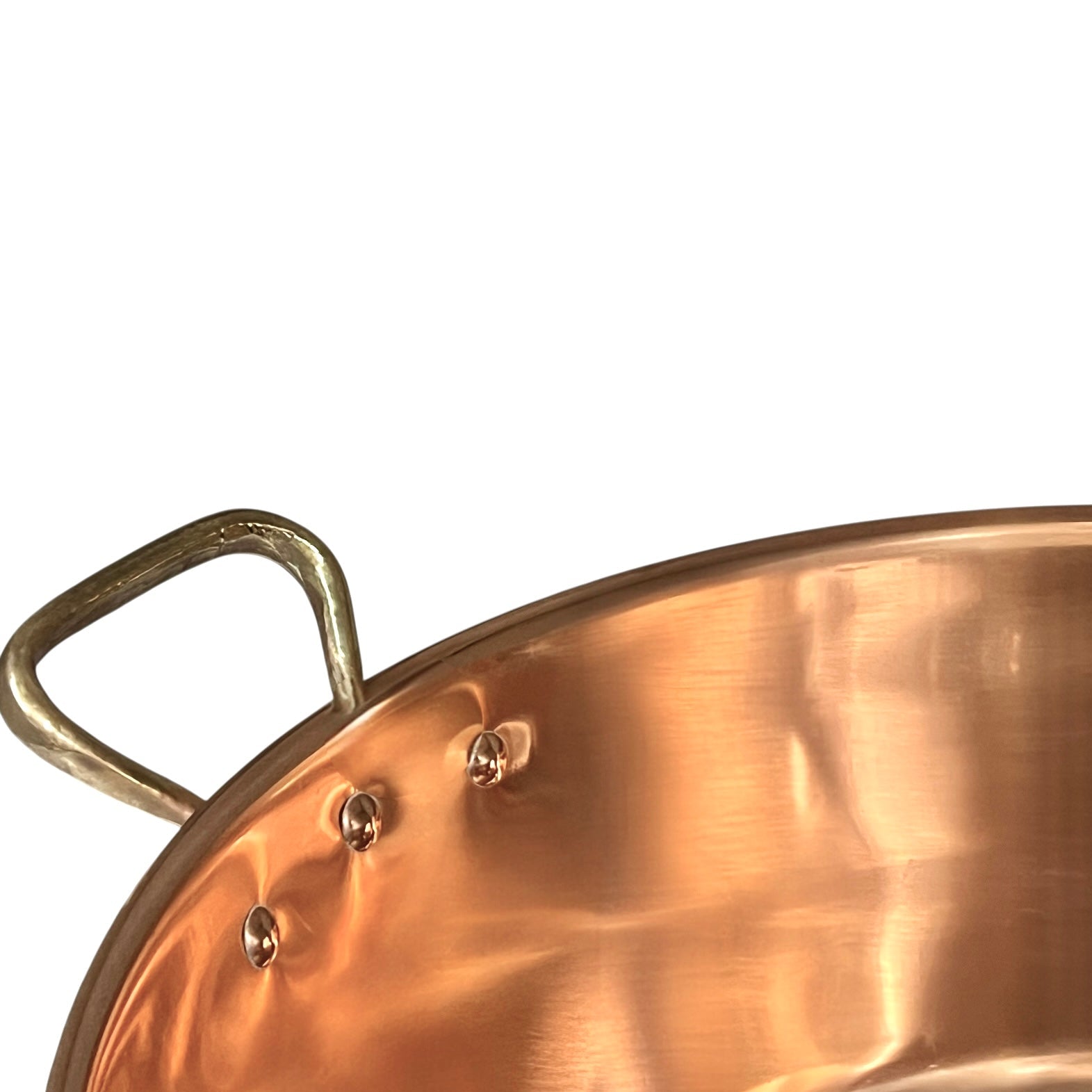 Close up of a copper basin sink on a white background