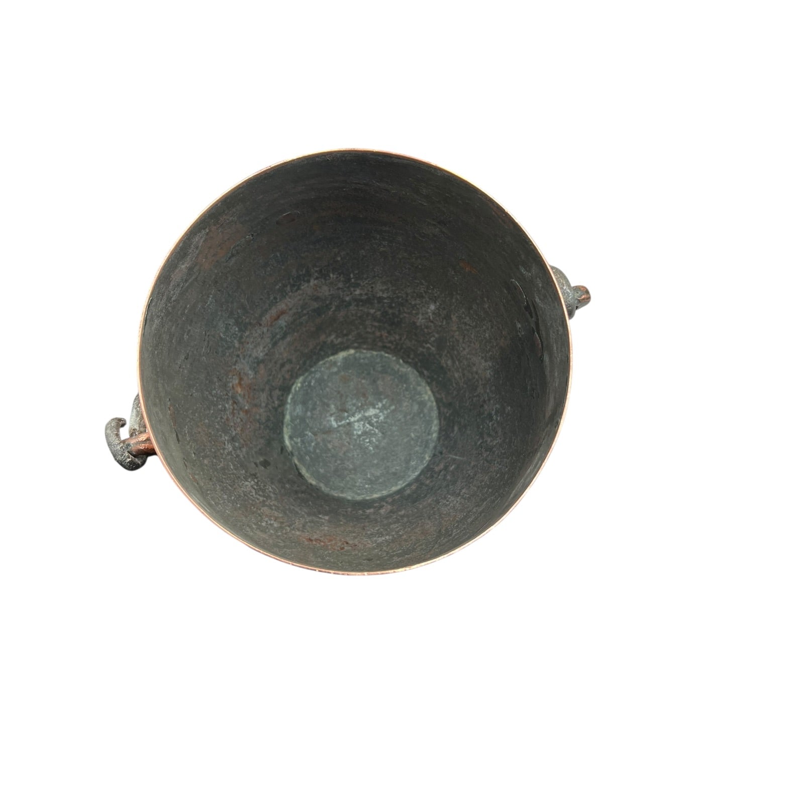 Inside of a copper cooking pot stockpot with handles on a white background