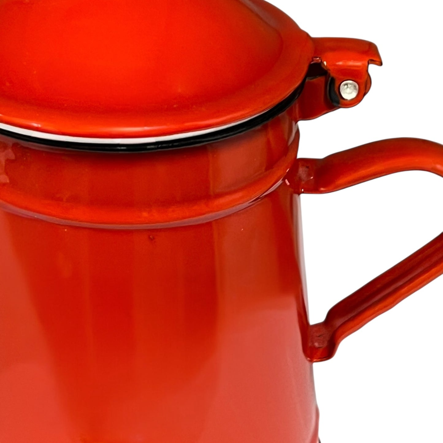 Close-up of a red teapot on a white background