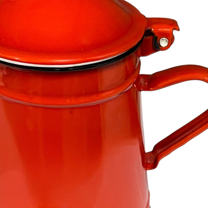 Close-up of a red teapot on a white background
