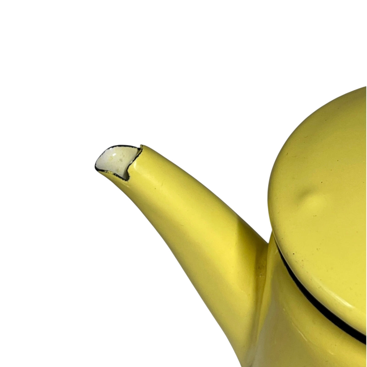 Close-up of a yellow enamel teapot showing a chipped edge on the spout against a plain white background.