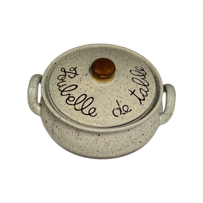 French vintage ceramic beige and brown speckled table bin with “Poubelle de Table” inscribed on the front, featuring a lid, perfect for a country cottage or for outdoor dining at a BBQ, displayed against a white background.