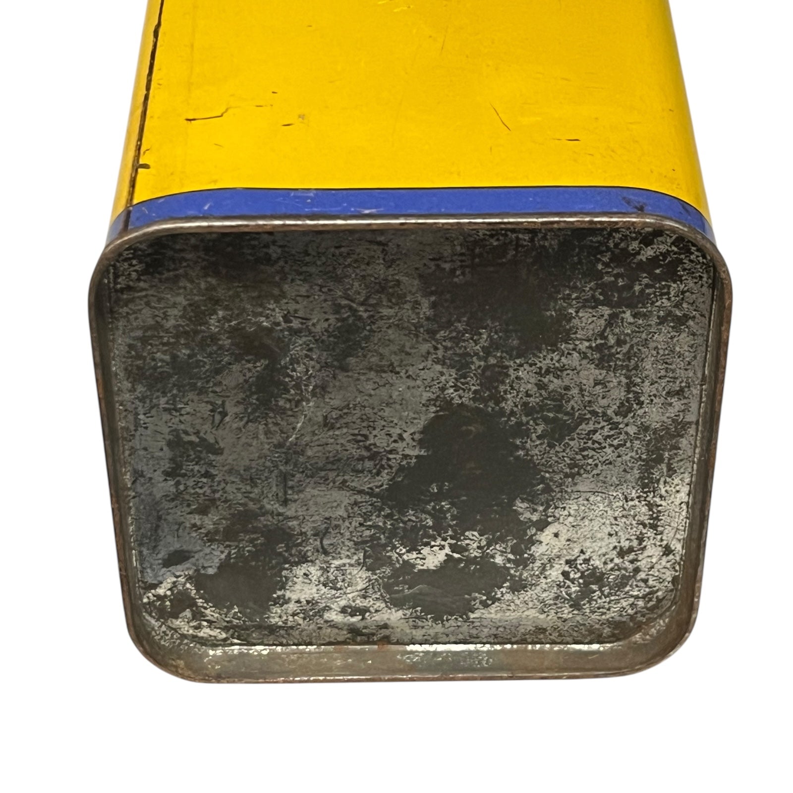 Vintage tin can with a colourful design featuring a face and 'Banania' branding on a white background.