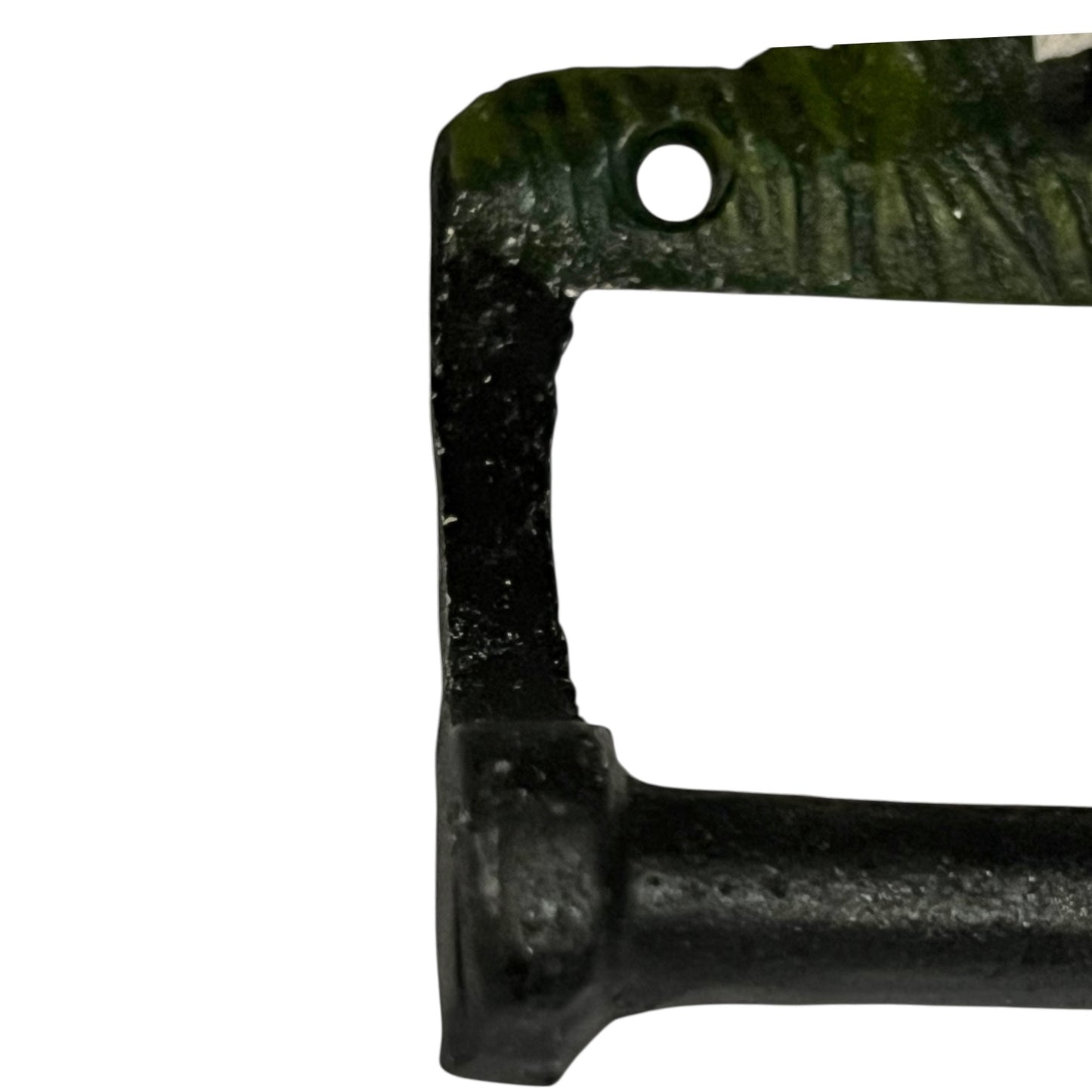 Close-up of a cow-shaped toiler paper roll holder  on a white background